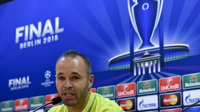 Barcelona midfielder Andres Iniesta talks during a news conference before a training session on June 2, 2015. Barcelona will play the Uefa Champions League final against Juventus at the Olympic Stadium in Berlin on June 6, 2015. AFP PHOTO/ JOSEP LAGO