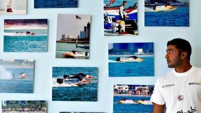 Ahmed Al Hameli looks back at some past pictures of him at the Abu Dhabi International Marine Club to relive his glory days. Christopher Pike / The National