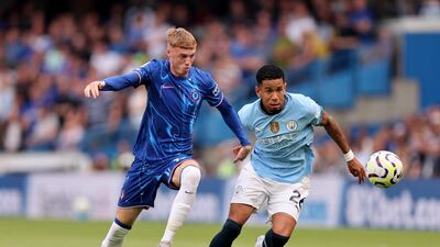 Manchester City's Savinho in action with Chelsea's Cole Palmer. Reuters