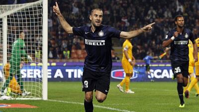 Rodrigo Palacio celebrates after scoring in Saturday's win over Verona. Alessandro Garofalo / Reuters