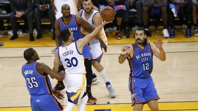 Stephen Curry drives to the basket during Game 5 of the Western Conference Finals. John Mabanglo Corbis / EPA
