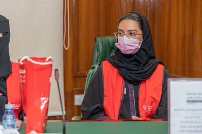 Shahd Abdullah, 22, enjoys meeting local and foreign visitors at the Qemam International Festival for Mountain Performance Arts. Photo: Shahd Abdullah