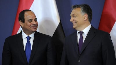 Egyptian President Abdel Fattah al-Sisi (L) and Hungarian Prime Minister Viktor Orban (R) smile during a signing ceremony in the Parliament building in Budapest, Hungary. Zoltan Mathe / EPA