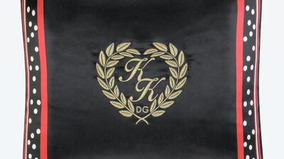 From the new Dolce & Gabbana and DJ Khaled collection, a cushion is embroidered with the DJ's initials. Courtesy Dolce & Gabbana