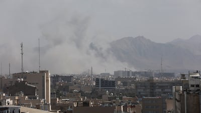 Smoke rises in Tehran following an explosion after Israel and the US launched strikes. Reuters