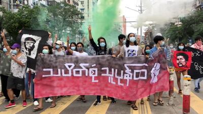 People protest against the junta in Yangon, Myanmar. The UN is expected to hold a General Assembly vote on stopping arms flows to the country's military. News Ambassador via Reuters