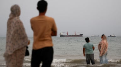 The Strait of Hormuz remains virtually shut, causing mass disruption to global energy flows. Reuters