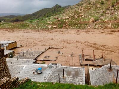 Floodwaters cover homes in the town of Mamoulan in Iran's Lorestan province. AP Photo