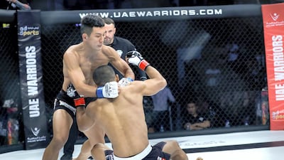 Lee Do-gyeom on his way to victory over Rolando Dy. Victor Besa/The National