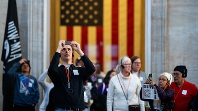 Tourists take photos as they enter the US Capitol Rotunda in Washington, DC. Getty Images