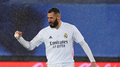 Karim Benzema celebrates after opening the scoring in Real Madrid's 2-0 win over Getafe at the Alfredo Di Stefano Stadium on Tuesday, February 9. AFP
