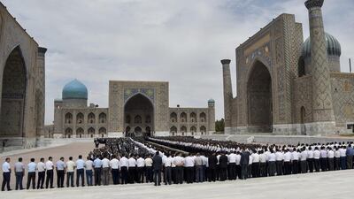 People gather to pay their last respect during the funeral of President Islam Karimov at the historic Registan Square in Samarkand, Uzbekistan, early Saturday, September 3, 2016. (AP Photo)