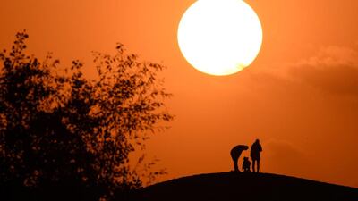 Tourists travel at sunset in Tarim, Xinjiang Uygur autonomous region, China, on October 27, 2016. China Daily via Reuters