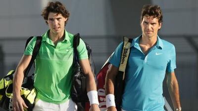 Rafael Nadal, left, is unhappy that Roger Federer has not raised his voice against the schedule.
