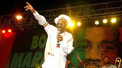 Bunny Wailer performs at the One Love concert to celebrate Bob Marley's 60th birthday, in Kingston, Jamaica, in 2005. AP Photo