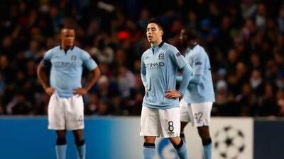 Samir Nasri, centre, has been criticised for his performances in the past by his Manchester City manager, but Roberto Mancini says he believes the French midfielder is 'one of the best players in England.' AP Photo