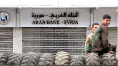 Banking transactions such as trade finance or corporate lending have taken a big hit since the start of the crisis in Syria. Louai Beshara / AFP