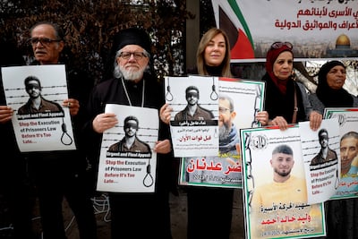 Palestinians hold a protest against the Israeli death penalty law in Ramallah. Reuters