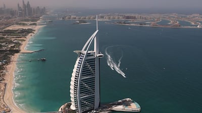 A temporary house built near the Burj al Arab for the New Year celebrations has sunk in bad weather.