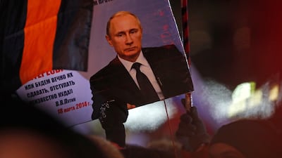 A banner in support of Vladimir Putin Pavel Golovkin / AP