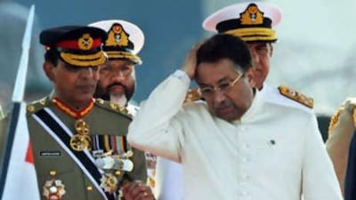 Pervez Musharraf, right, pakistan's president, is accompanied by Gen Ashfaq Parvez Kayani, left, as he attends a military parade in Islamabad.
