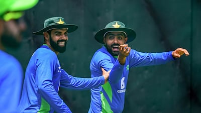 Pakistan captain Babar Azam, right, and Shadab Khan during a practice session at the R Premadasa Stadium in Colombo on the eve of their Asia Cup match against India. AFP
