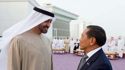 General Sheikh Mohamed bin Zayed Al Nahyan Crown Prince of Abu Dhabi Deputy Supreme Commander of the UAE Armed Forces (L) meets with Vice President of the Philippines, Jejomar Binay (R) at a majilis gathering.