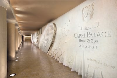 The entrance to Jumeirah Capri Palace reveals part of Pomodoro's installation. Photo: Jumeirah