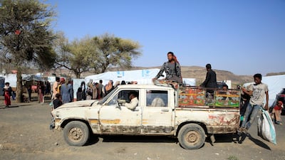 Displaced Yemenis ride a truck through a camp for Internally Displaced Persons (IDPs) on the outskirts of Sana'a, Yemen, 14 June 2022. EPA