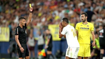 Casemiro of Real Madrid is shown a yellow card from referee, Jesus Gil Manzano during the Liga match between Villarreal CF and Real Madrid CF at Estadio de la Ceramican Villareal, Spain. Getty Images