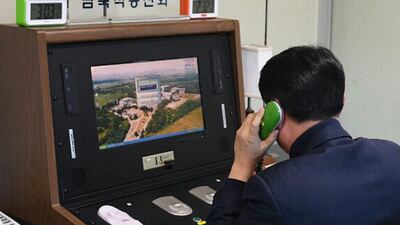 A South Korean official uses a cross-border hotline at the liaison office in the Joint Security Area.