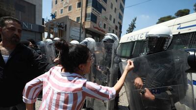 epa09299090 Palestinian activists protest against the Palestinian president Mahmoud Abbas following the death of human rights activist, Nizar Banat. EPA