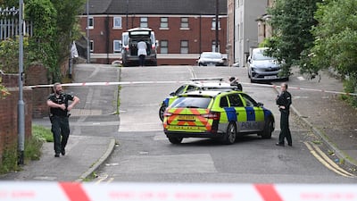 Police at the scene of the stabbing attack in Belfast. Getty Images