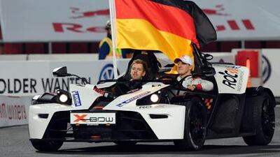 Sebastian Vettel and Michael Schumacher at the Race of Champions in Bangkok.