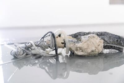 Mire Lee’s ‘Ophelia’, which, powered by a motor, flails around in a shallow pool of viscous glycerine Reem Mohammed/The National