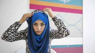 Step 4: Rearrange the folds to keep them away from your face. Accessorize with a tiara if you like for an evening look.