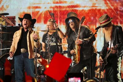 Cody Johnson, Billy Gibbons and Slash perform a tribute for Gary Rossington of the Lynyrd Skynyrd band during the CMT (Country Music Television) Music Awards in Austin, Texas, U. S. , April 2, 2023. REUTERS / Mario Anzuoni