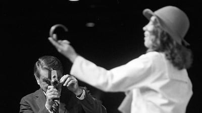 Edwin Land does a theatrical demonstration in 1977 of the Polavision movie camera with the help of a dancer.