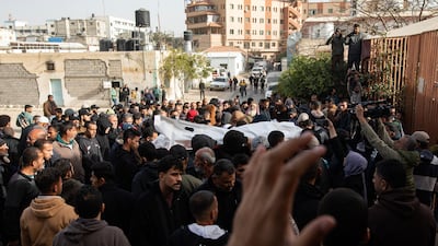 Palestinians mourn lost loved ones during a funeral service at Nasser Hospital in Khan Younis. EPA
