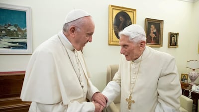 Pope Francis, left, and his predecessor, Pope Emeritus Benedict XVI, have different approaches to running the Catholic Church. Reuters