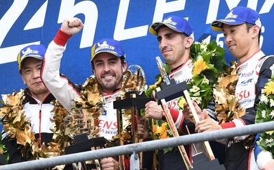 Fernando Alonso with teammates after winning in the 87th edition of the 24 Hours Le Mans endurance race in June, 2019. AFP