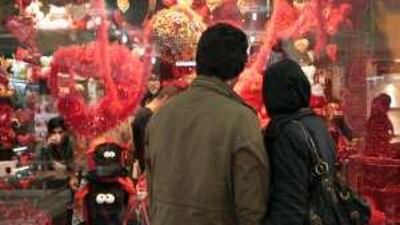 Young people shop for Valentine's gifts in a mall outside Tehran on Valentine's Day.