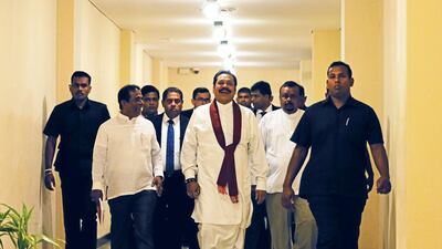 Sri Lanka's newly appointed Prime Minister Mahinda Rajapaksa arrives at the parliament in Colombo, Sri Lanka November. Reuters