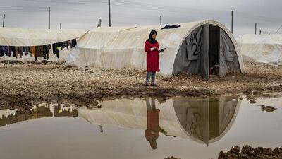 A displaced Syrian woman is pictured in the Washukanni Camp for the internally displaced people near the predominantly Kurdish city of Hasakeh in northeastern Syria. AFP