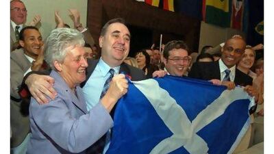 First Minister Alex Salmond celebrates with members of his Scottish National Party. Readers warn that Scotland should steer clear of the European Union if it did gain independence. Lakruwan Wanniarachchi / AFP