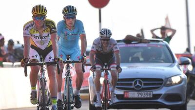 Alberto Contador, left, and Vincenzo Nibali cross the finish line joint-fourth in Stage 3. Luca Zennaro / EPA