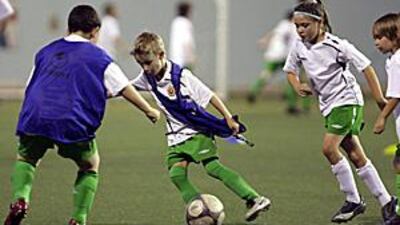 Children from Abu Dhabi Thistle FC during a training session at the British School in Abu Dhabi. The club currently fields seven sides.
