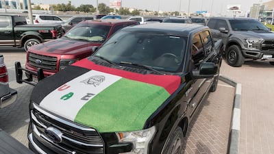 Some of the participating trucks were still decorated in UAE colours from the recent National Day celebrations. Antonie Robertson / The National