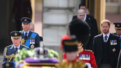 King Charles, Prince William and Prince Harry walk behind the coffin of Queen Elizabeth. AFP