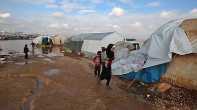 A Syrian woman at a camp for the internally displaced near the town of Kafr Lusin in the rebel-held north-west province of Idlib, near the border with Turkey. AFP